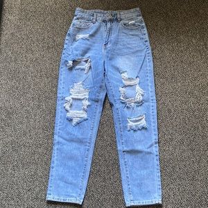 High waisted light washed ripped jeans
